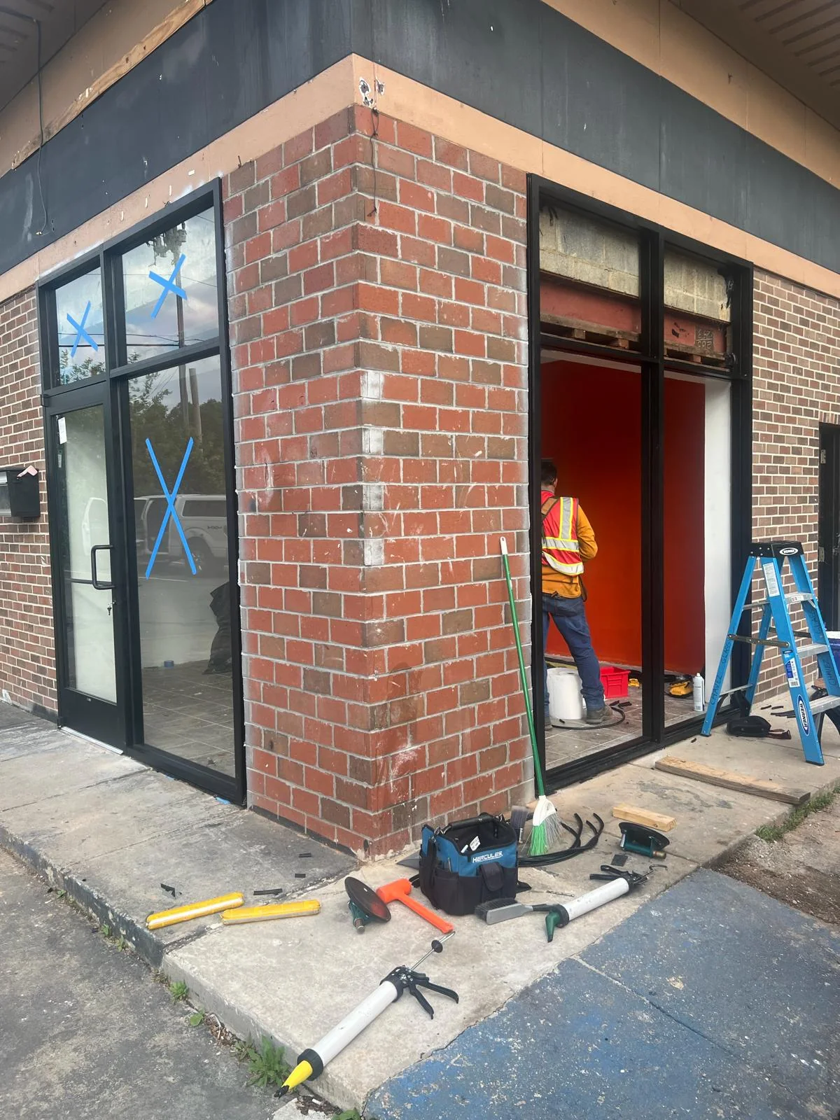 Beltway Safety Glass Repair team working on a commercial storefront glass installation